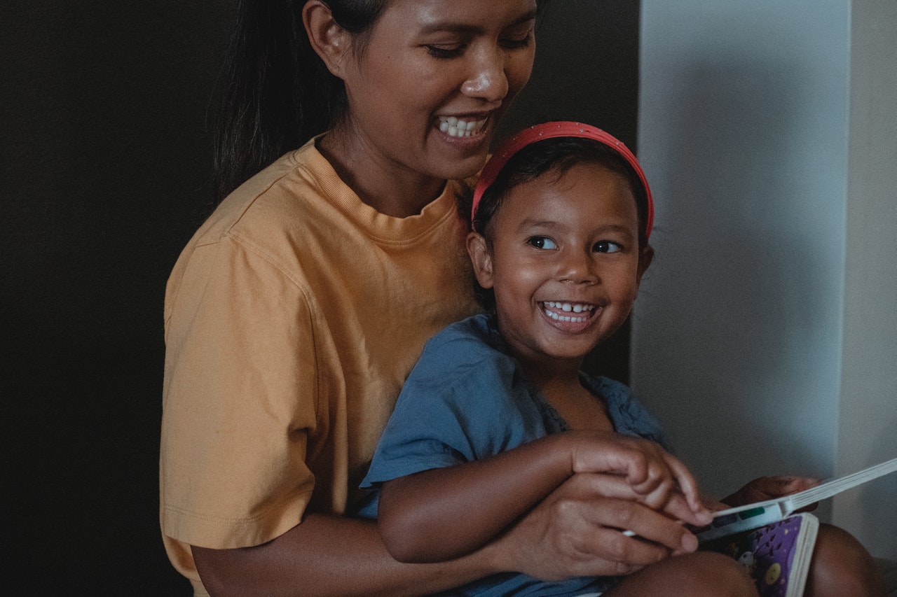 mom hugging her daughter