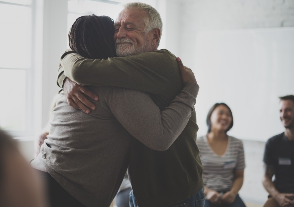 a man embracing a woman as gratitude