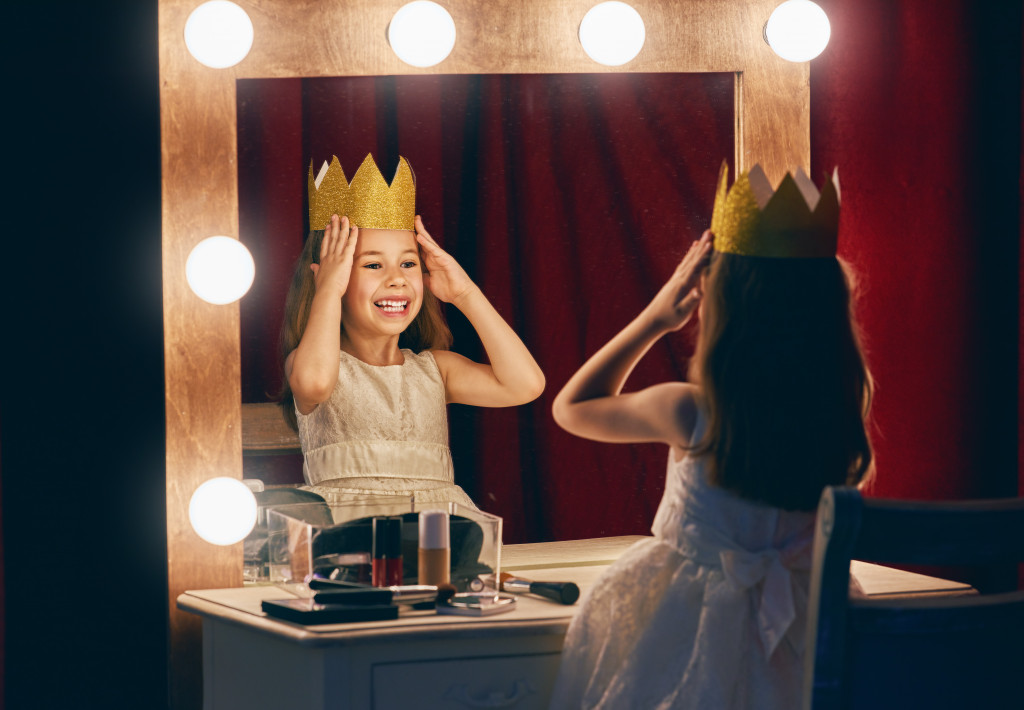 child preparing for a theater performance